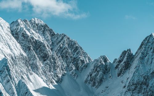Free Breathtaking view of snowcapped mountains in Yunnan, China captured in clear winter skies. Stock Photo