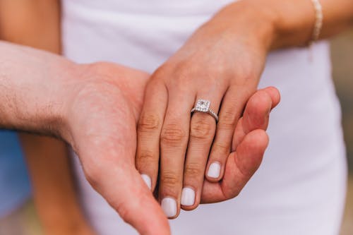 A Person Wearing a Silver Diamond Ring