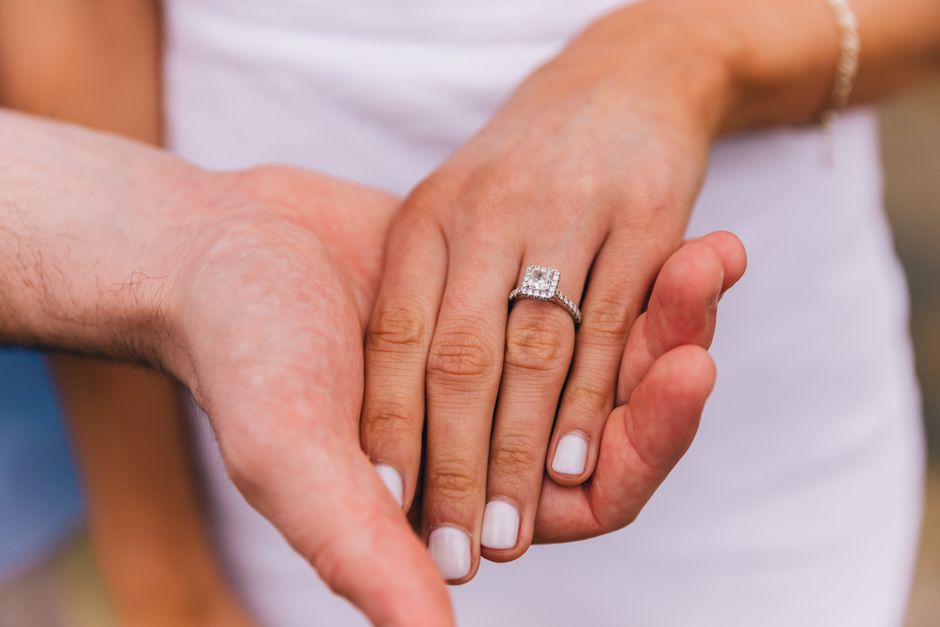 1 carat emerald cut diamond ring on a finger 1 carat emerald cut diamond ring on a finger