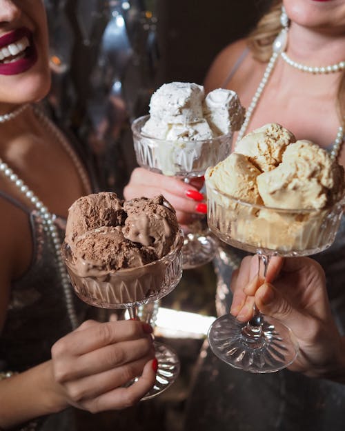 Free Women Holding Ice Cream Stock Photo