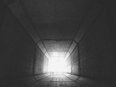 Dark concrete architecture by Possessed Photography on Pexels