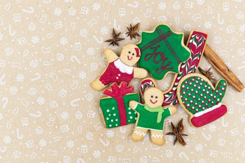 Red and Green Gingerbread Cookies  on Brown Printed Textile