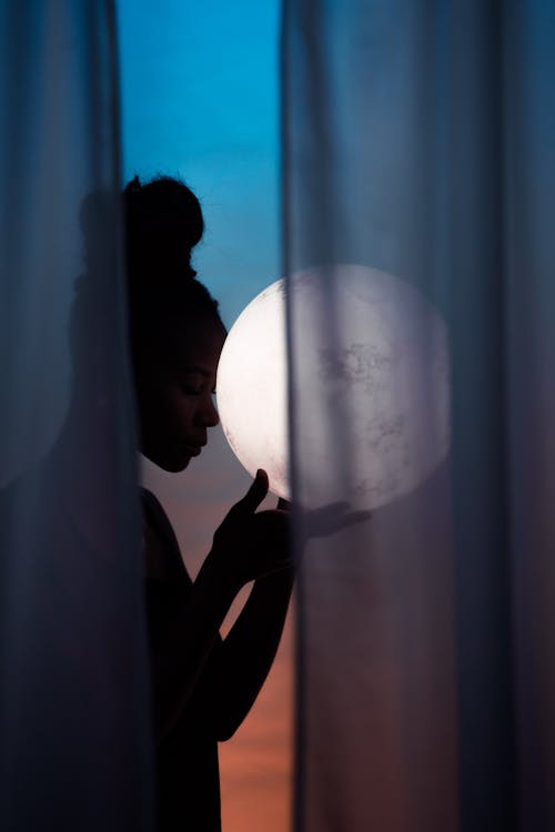 Free Silhouette of Woman and Full Moon Stock Photo