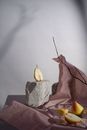 Cut Pear on Stone near Dish on Paper