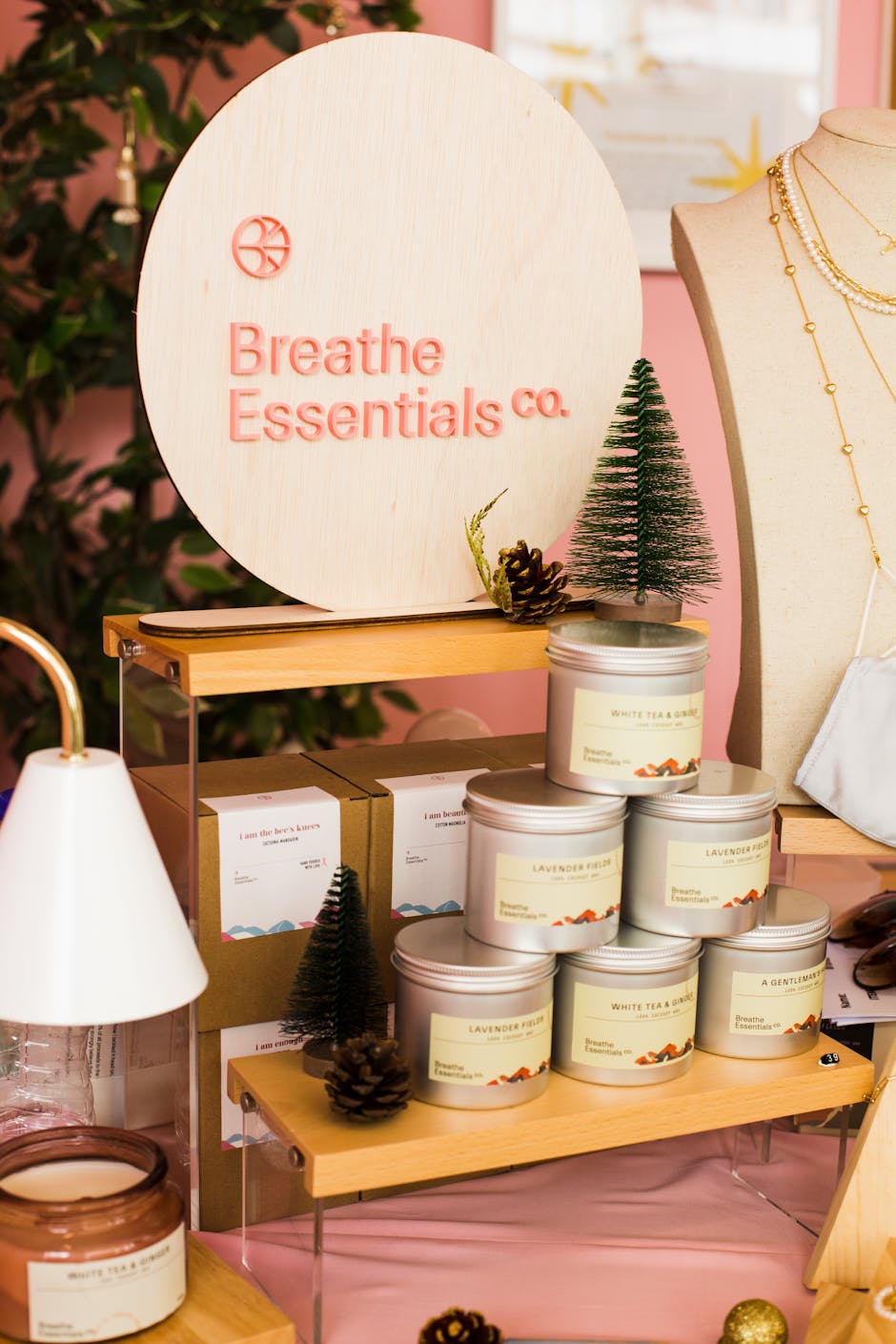 A stylish product showcase of scented candles by Breathe Essentials Co.