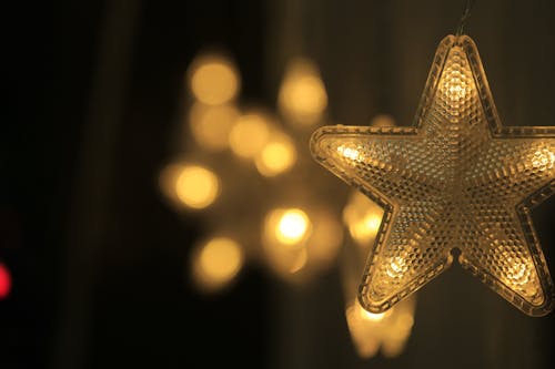 Illuminated Star Decoration in Close Up Photography