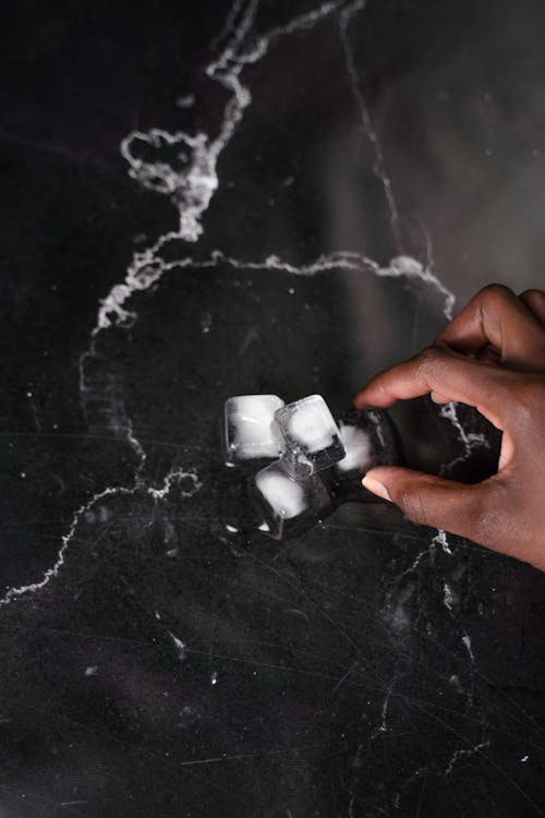 Ice cubes on Marble Surface