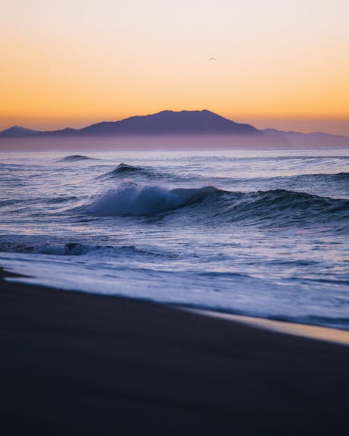 Scenic View of Ocean Waves Crashing on Shore