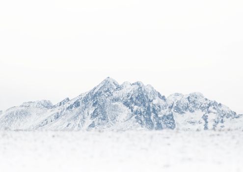 Majestic winter view of the snowy High Tatras in Slovakia, showcasing serene beauty.