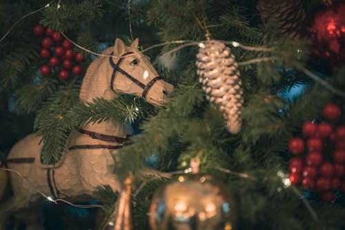 Close-up Shot of Christmas Tree with Assorted Hanging Ornaments