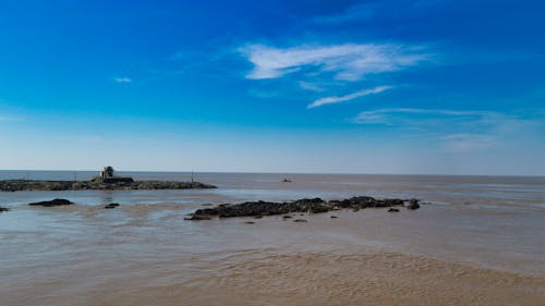 Fotos de stock gratuitas de cielo azul, costa, dice adiós