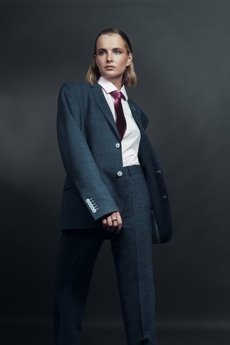 Woman In Suit And Tie