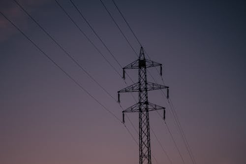 Black Electric Post Under Clear Sky 