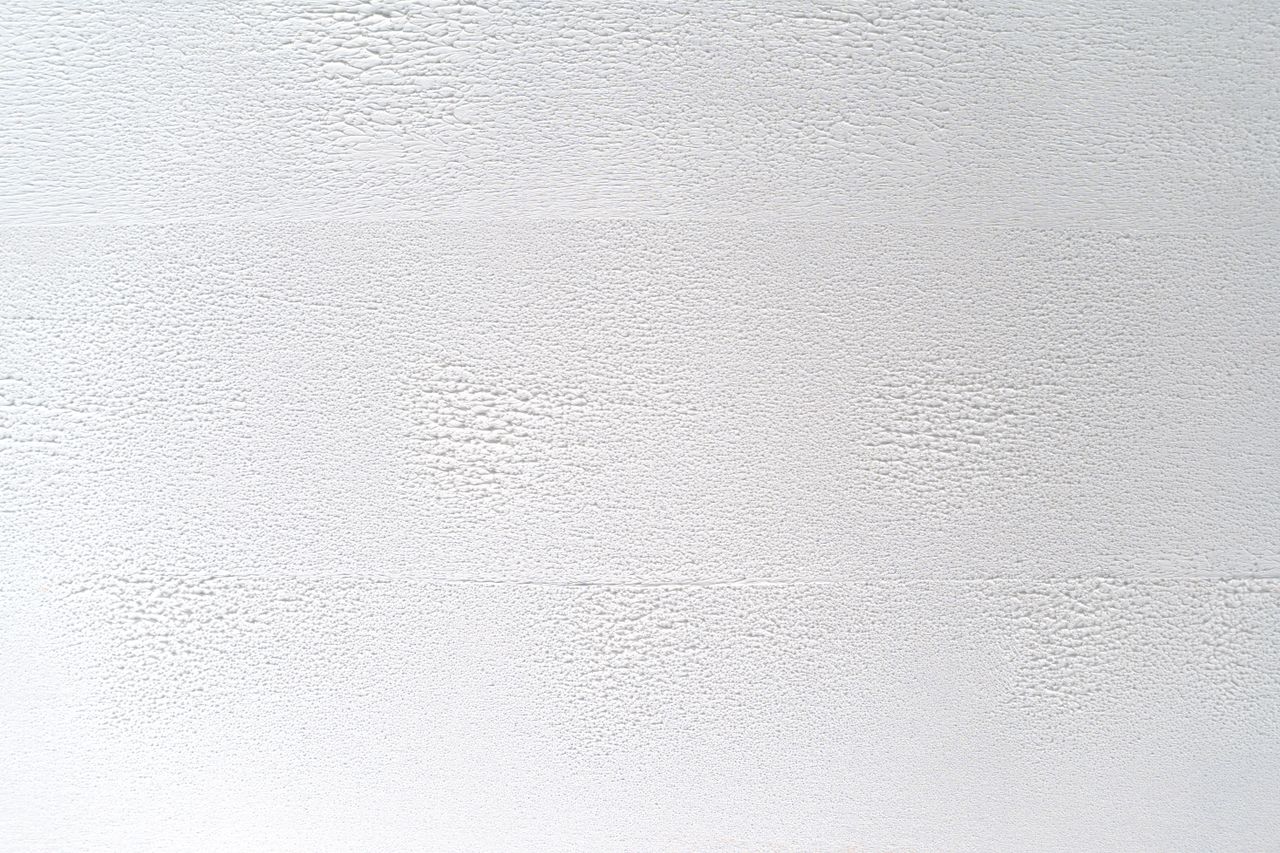 close up of a white textured wall perfect for backgrounds or design el
