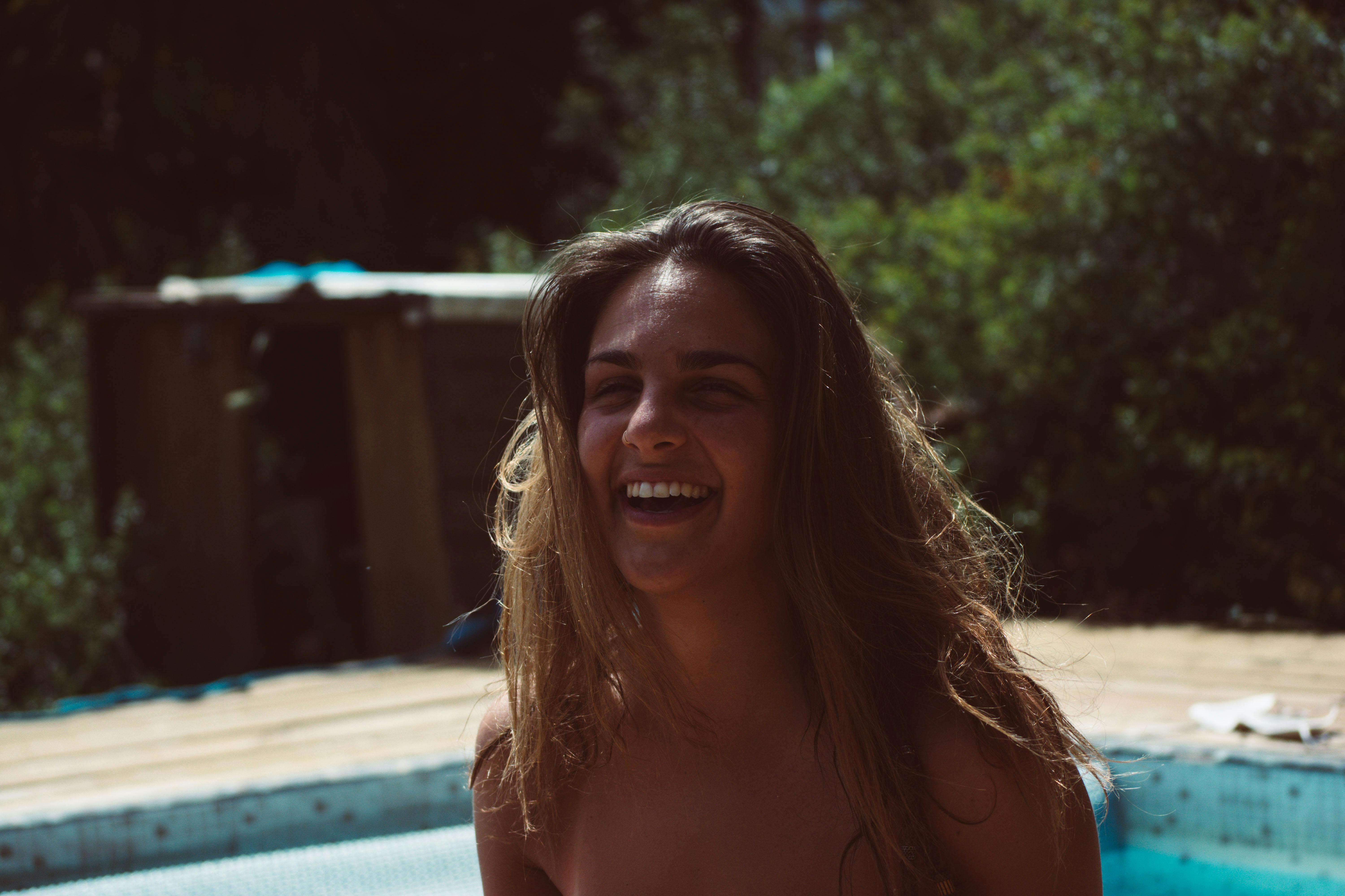 Woman Portrait Photo Near on Trees · Free Stock Photo