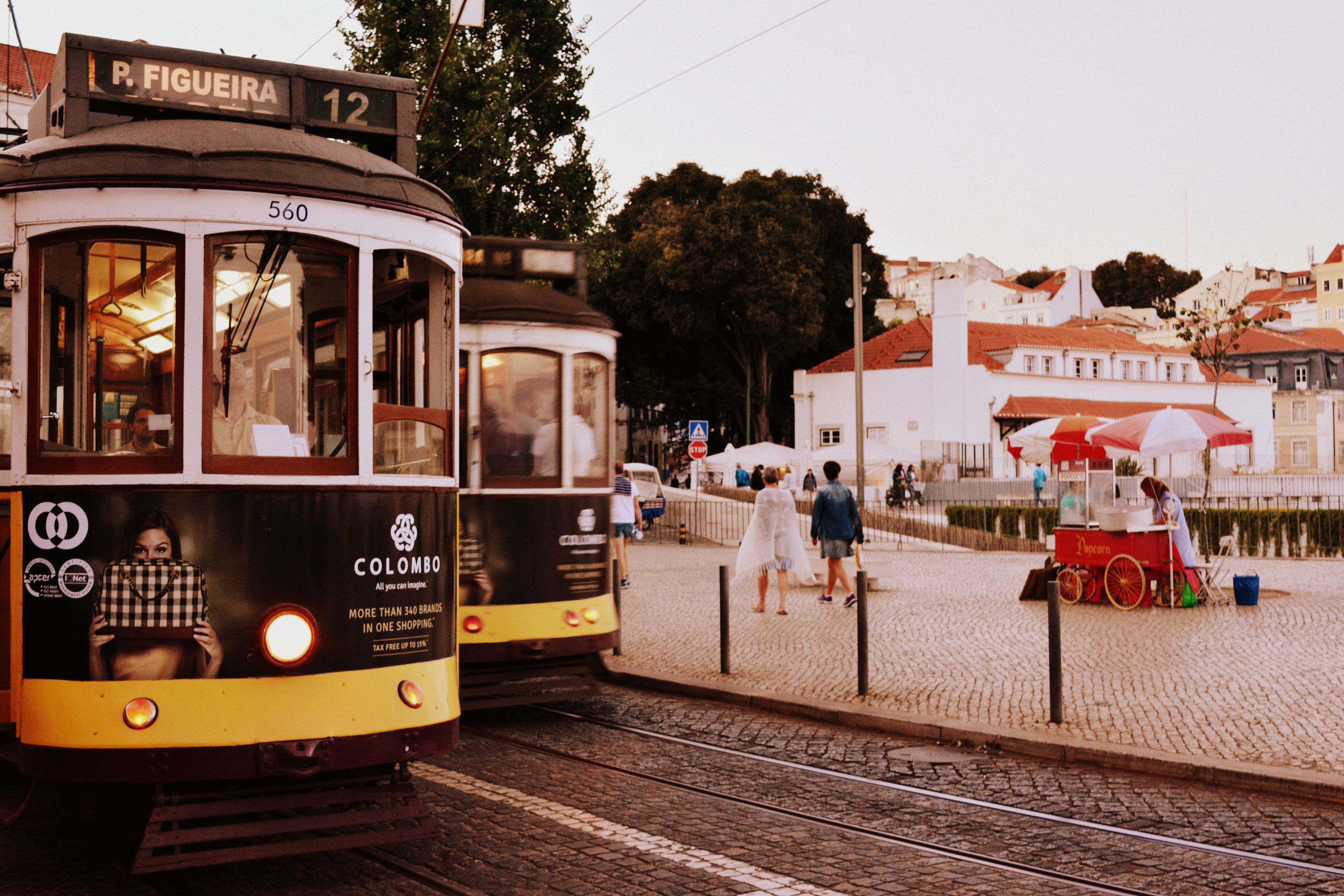 Flat central square in Lisbon's Baixa, with São Jorge Castle on the hill above