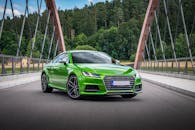 A Green Audi TTS on a Bridge