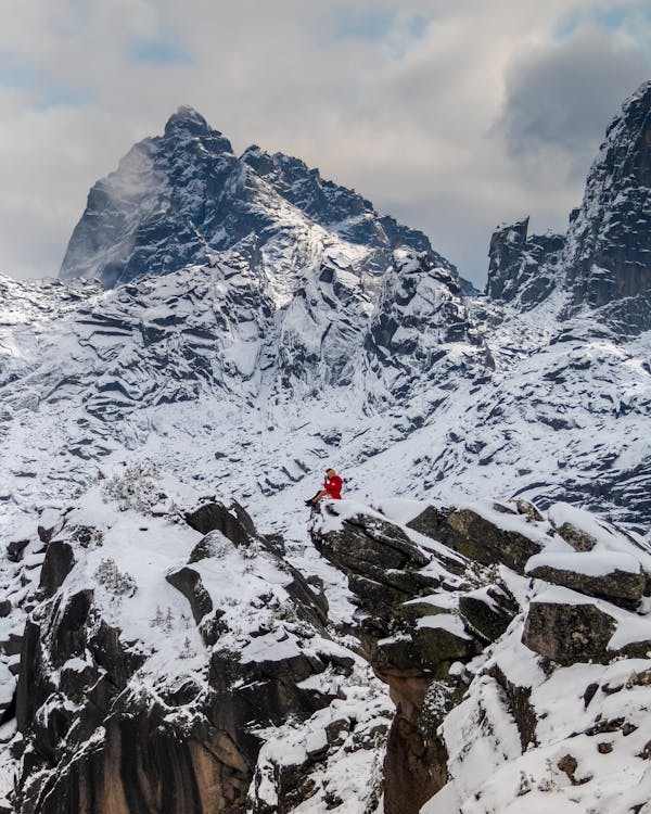 A Person on a Snowy Mountainside in Krasnoyarsk 