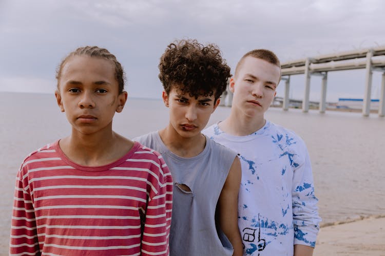 Group Of Teenagers Standing On Riverside