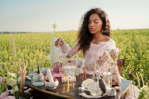 Woman Sitting on a Meadow in a Small Laboratory