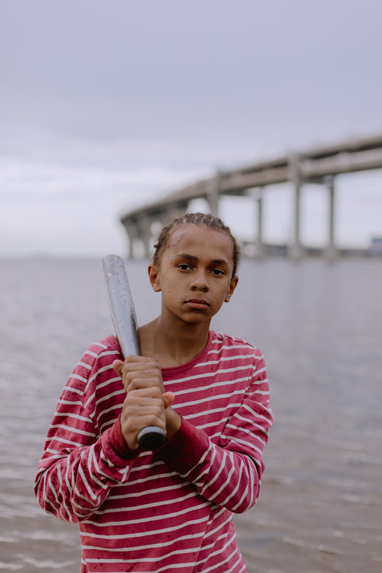 Kid Holding A Baseball Bat