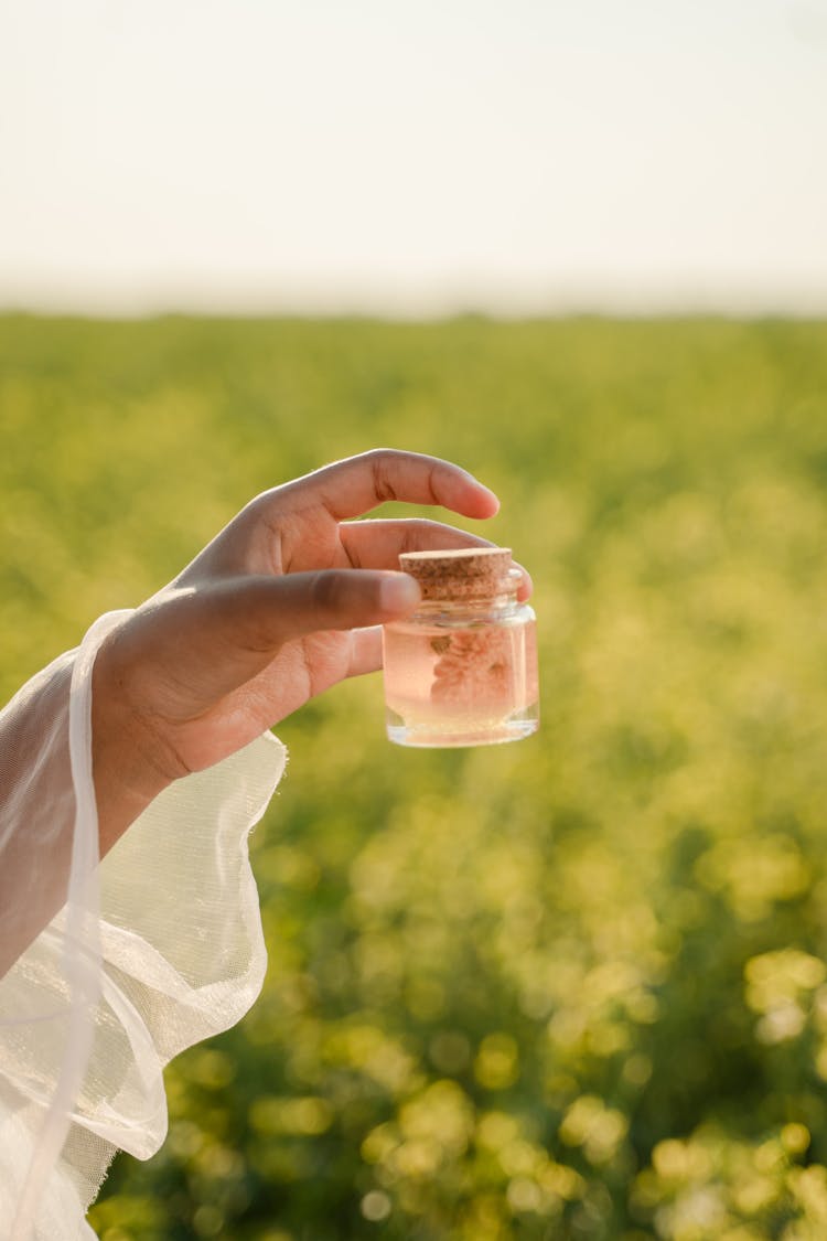 Woman Holding Jar