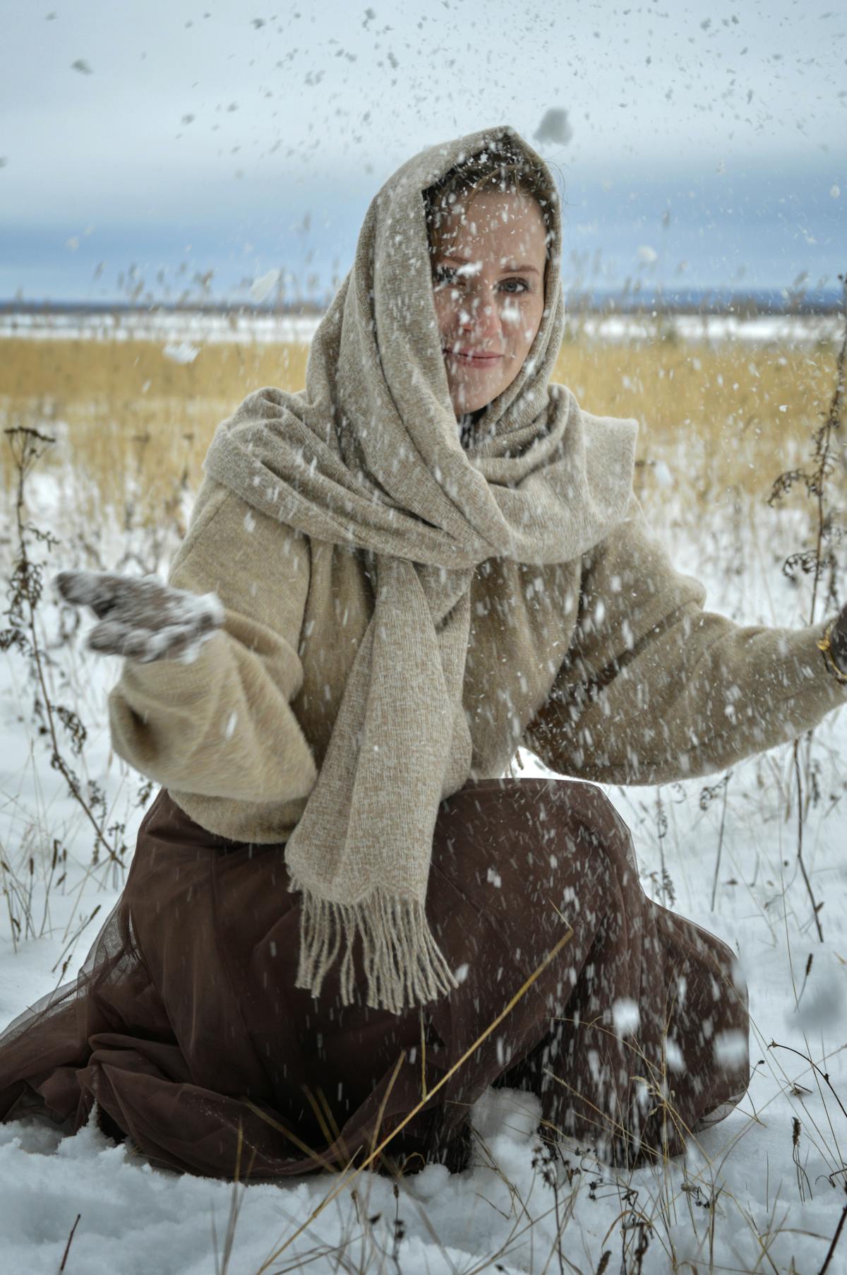 Influencer responding to followers comments on laptop and smartphone