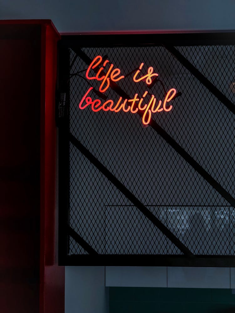 Life Is Beautiful Orange Neon Signage