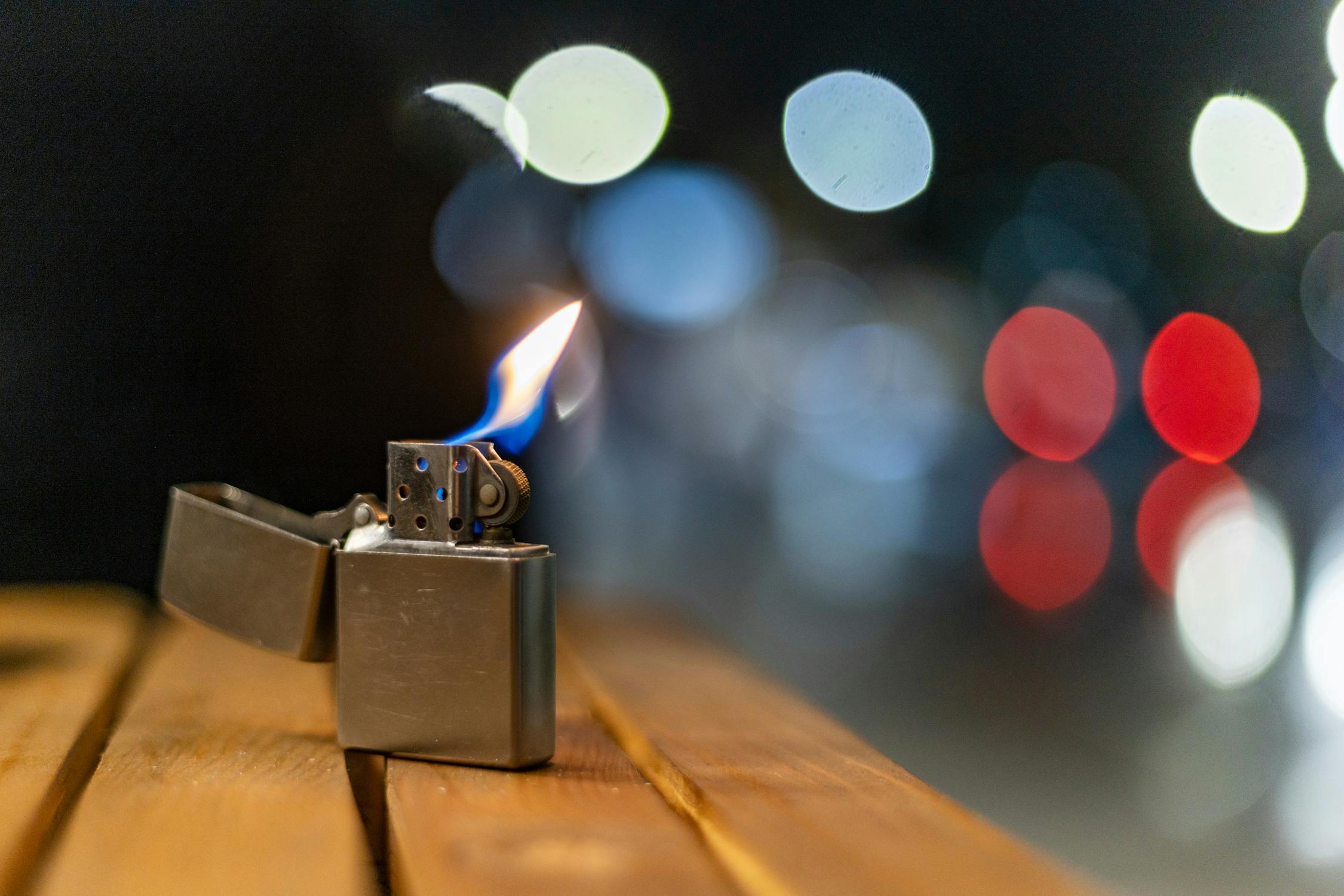 Burning Lighter on Table