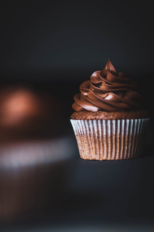 Free Brown Chocolate Cupcake on Black Surface Stock Photo
