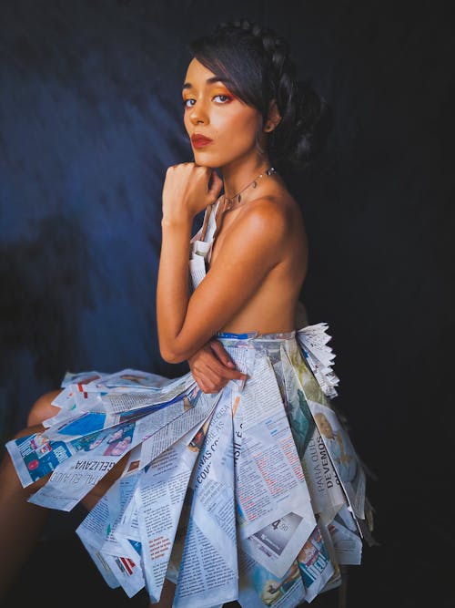 Beautiful Woman in Newspaper Dress