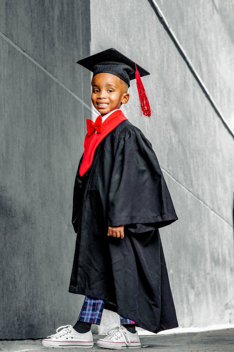 Young Boy Wearing Toga