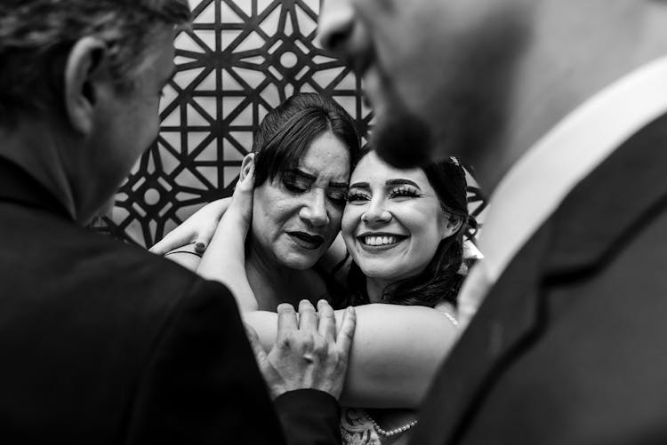 Bride Hugging Her Mother 