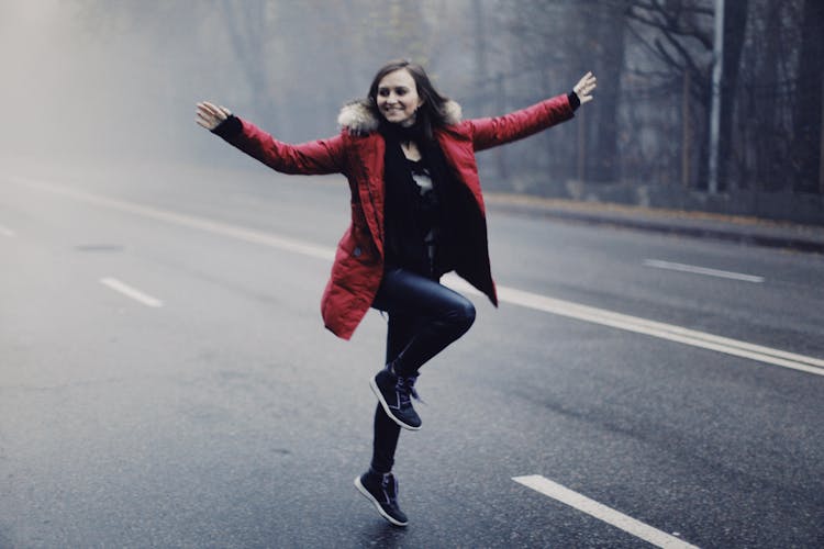 Happy Woman On Road