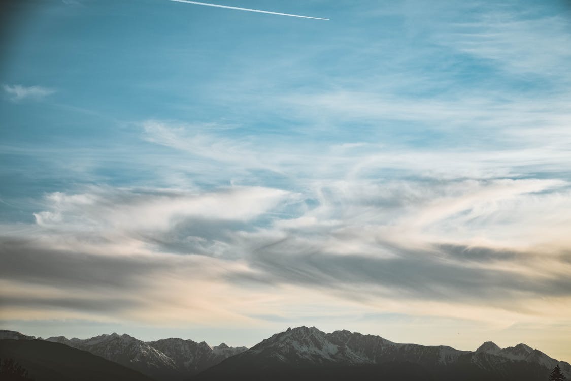 White Clouds Under Blue Skies Photo