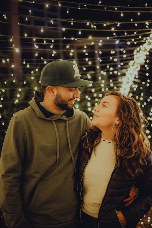 A Couple Standing while Looking at Each Other