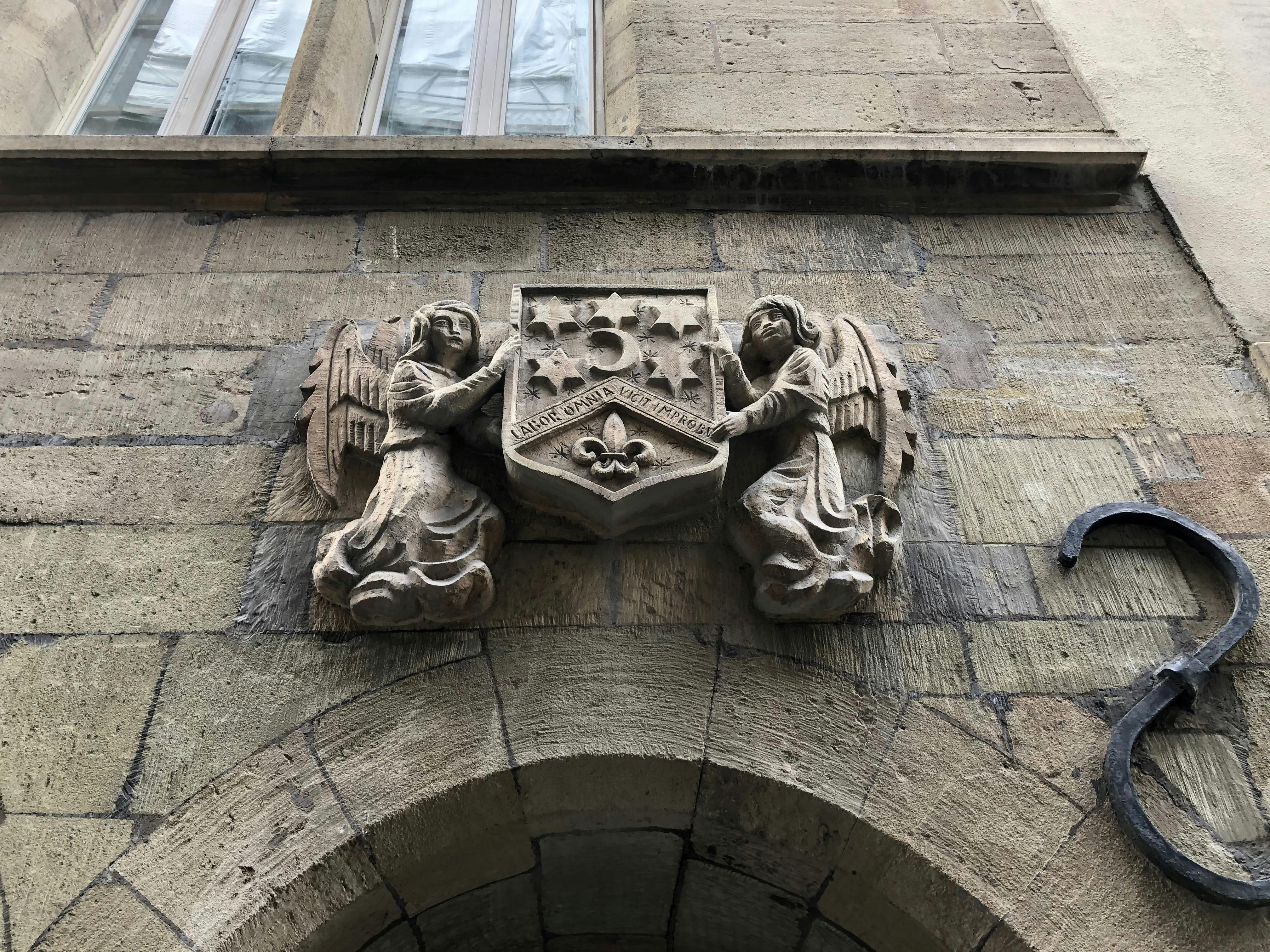 Collection of precision tools and screwdrivers laid out on a work surface