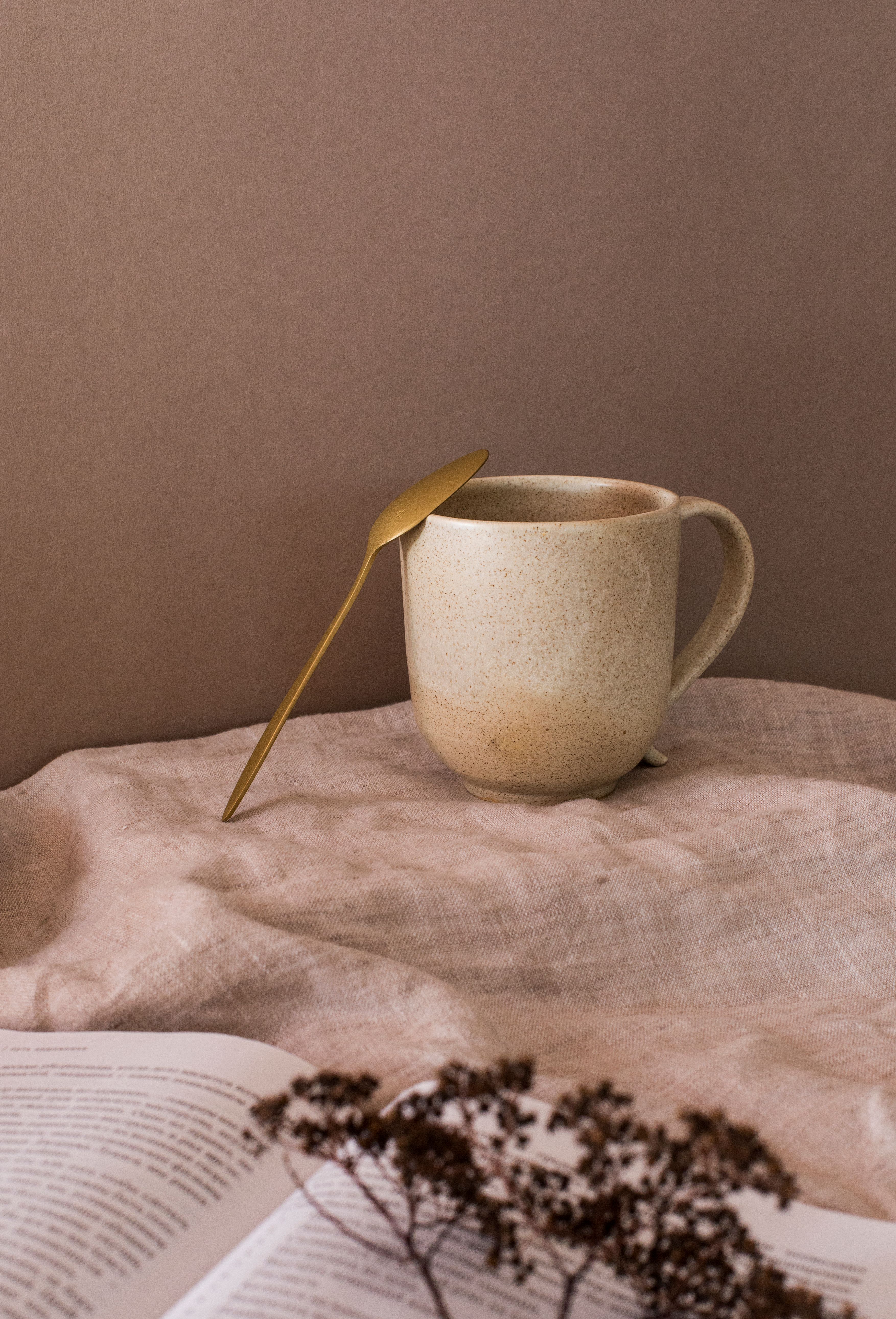 Thoughtfully selected everyday essentials in warm, natural tones