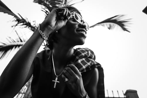 Free Black and White Photo of a Woman Touching Her Sunglasses Stock Photo