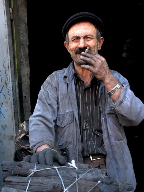 Elderly Man Smoking Cigarette 