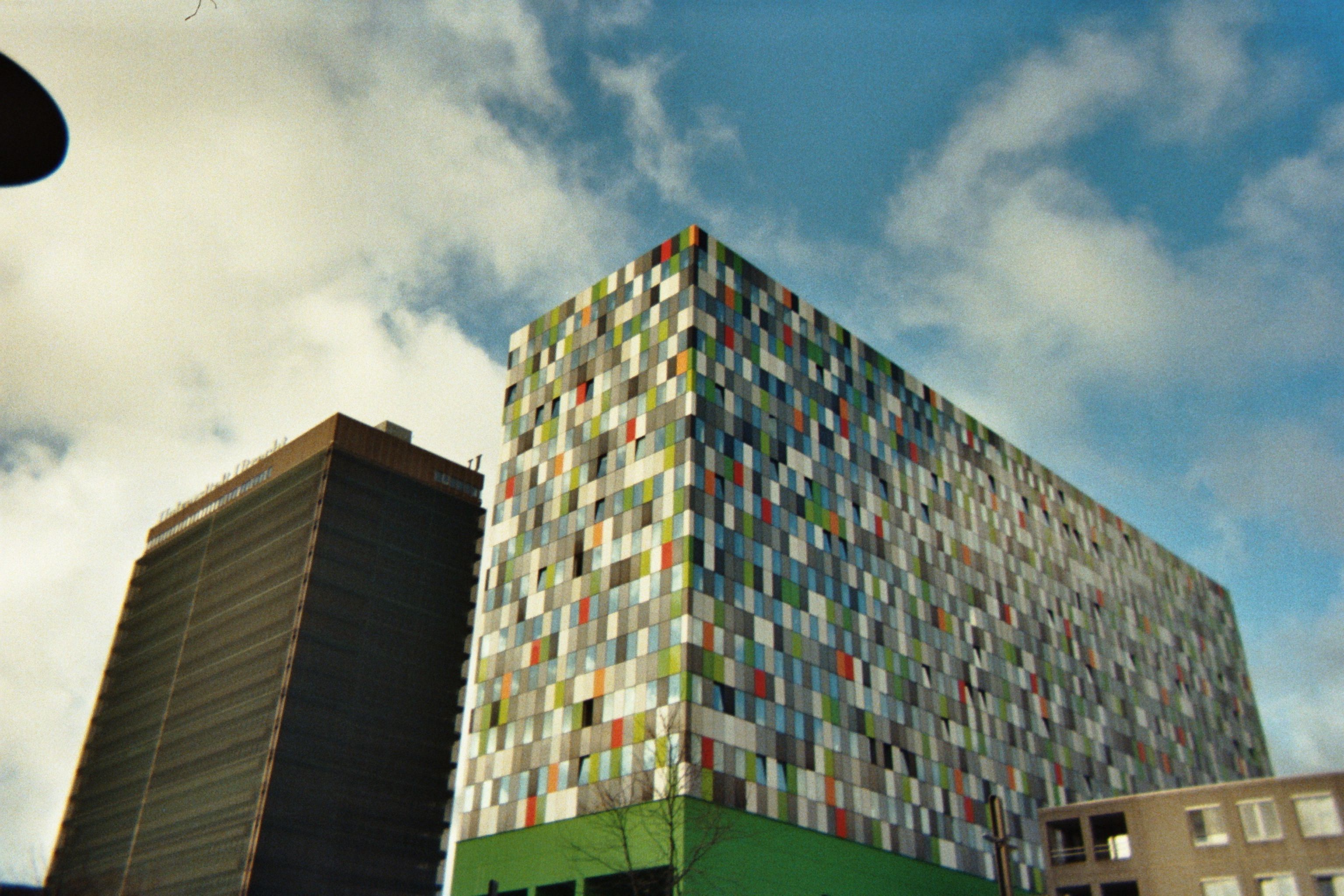Low-Angle Shot of High Rise Buildings under the Cloudy Sky · Free Stock ...