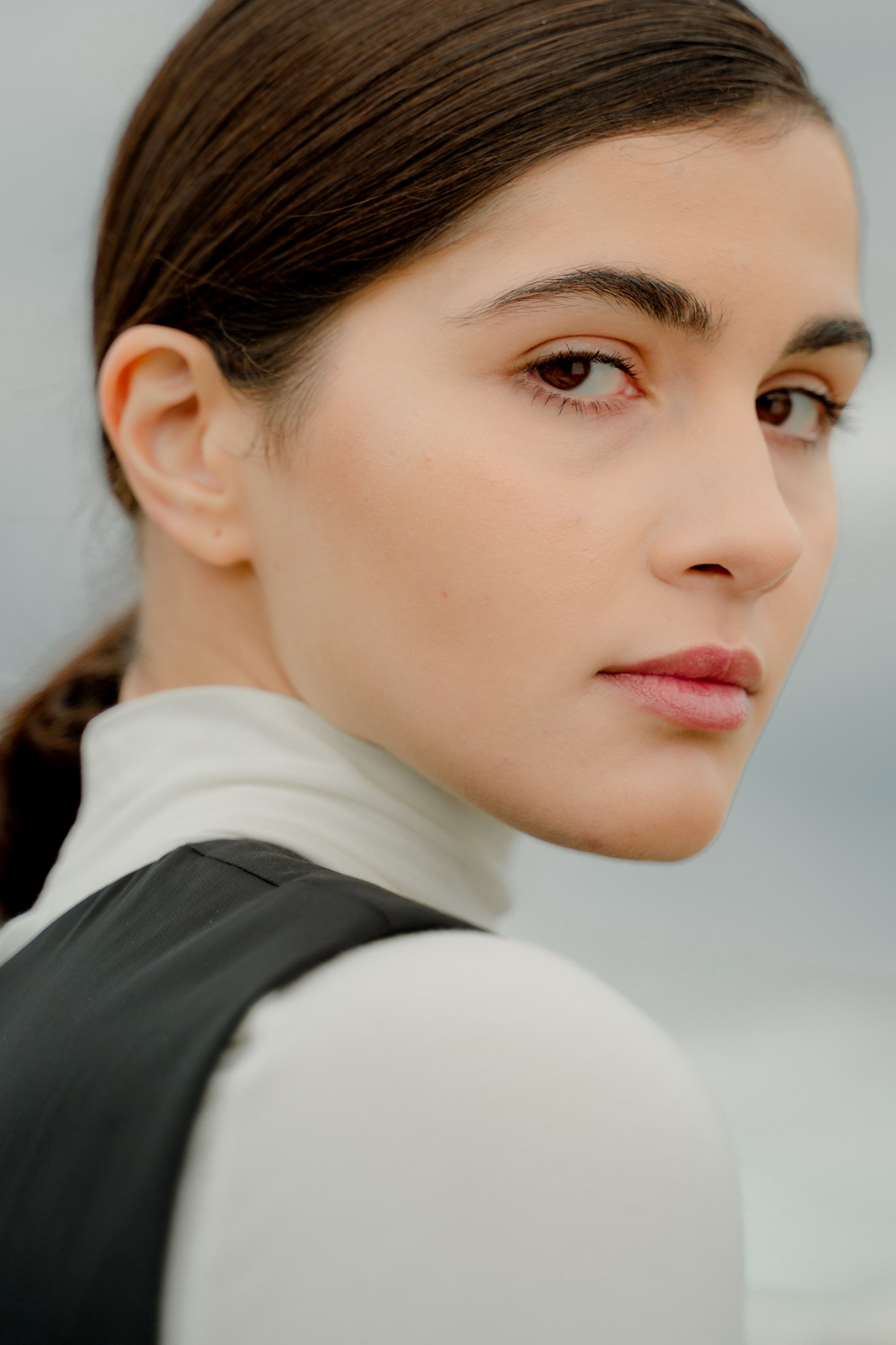 Portrait of a Woman Wearing a Black and White Top · Free Stock Photo