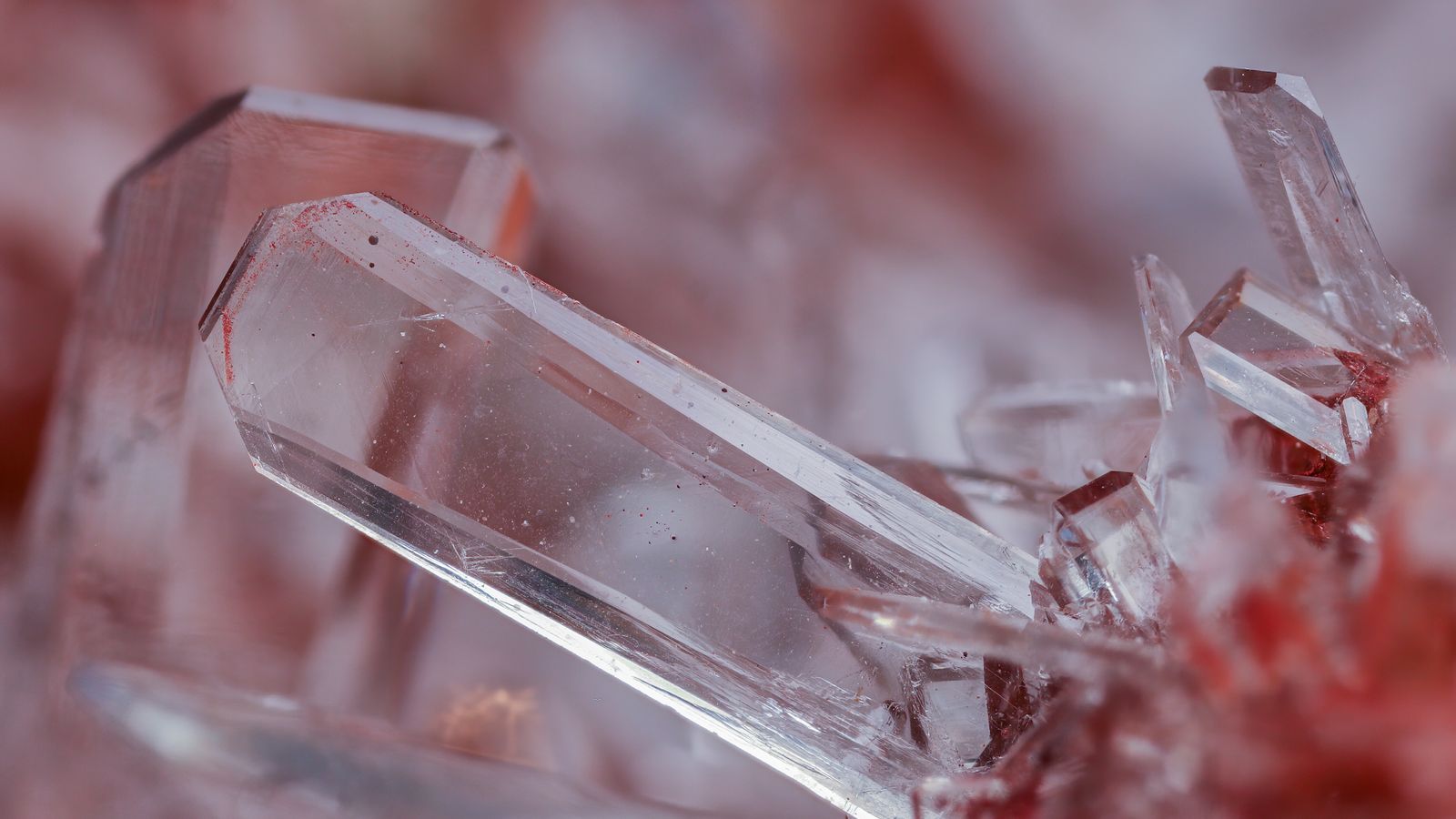 Close-up of clear quartz crystals showing their natural facets, a real stock photo with no people in the frame, chosen because crystals sit at the center of the Final Fantasy series and of Nintendo's tagline for this game. It is not a screenshot from the game