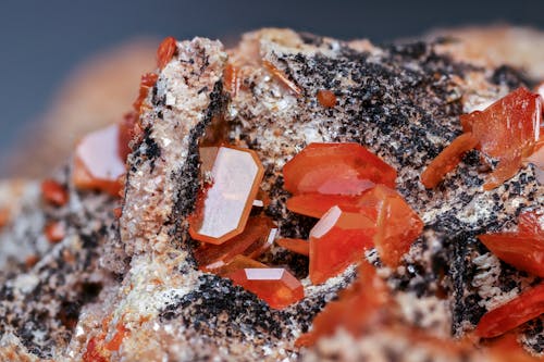 Red Crystals on Rock
