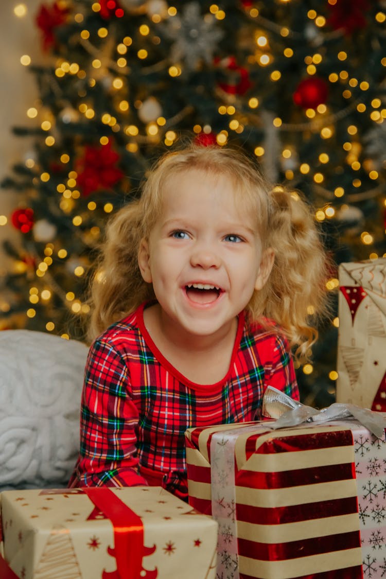 Smiling Girl, Gifts And Christmas Tree