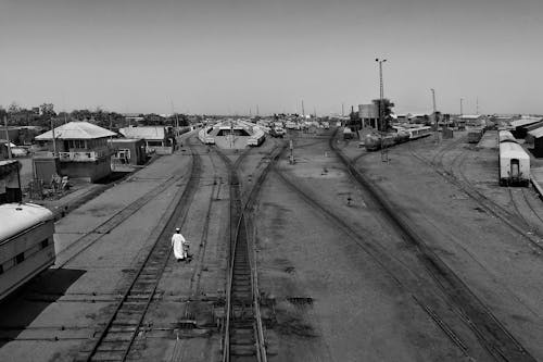 Grayscale Photo of Railway Station