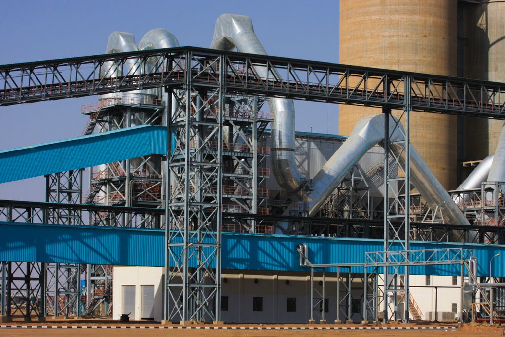 Industrial production plant with steel structures and pipes
