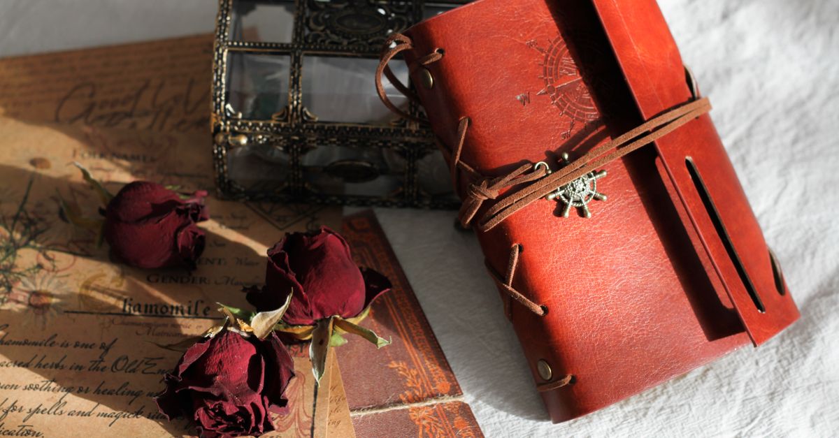 Red Roses Notebook Red Roses Beside Red Notebook · Free Stock Photo