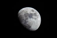 White and Gray Moon on Black Background