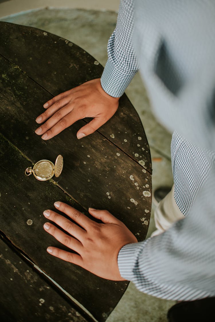 Open Pocket Watch Lying On Table